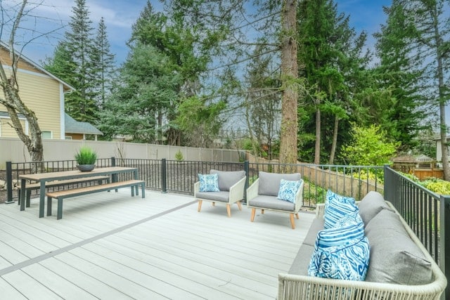 Backyard deck with freshly painted wooden bench in Loveland, CO